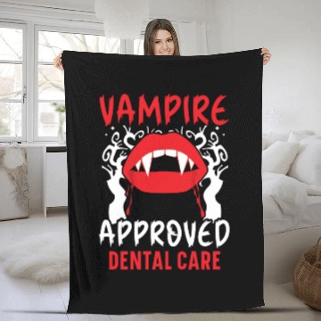 Discover Vampire-Approved Dental Care. Fleece Blankets