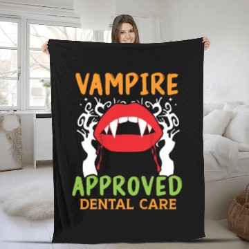 Discover Vampire-Approved Dental Care. Fleece Blankets