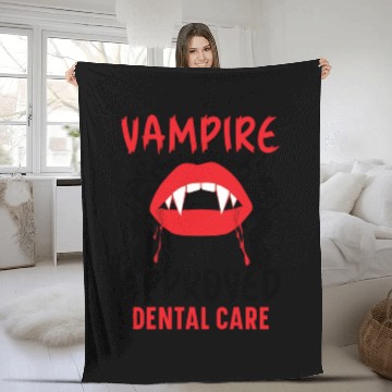 Discover Vampire-Approved Dental Care. Fleece Blankets