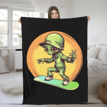 Discover Alien on a Space Skateboard at Sunset Fleece Blankets
