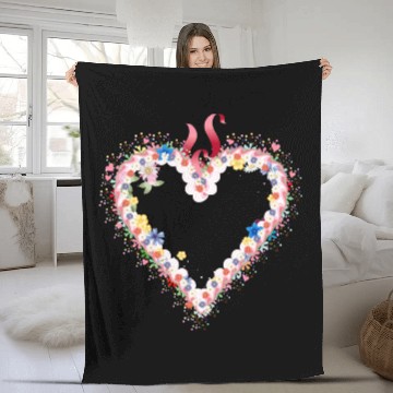 Discover Gingerbread heart shape with icing and bow Fleece Blankets