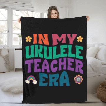 Discover In my Ukulele teacher era Fleece Blankets