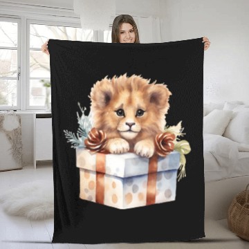 Discover African Lion inside a Christmas gift box Fleece Blankets
