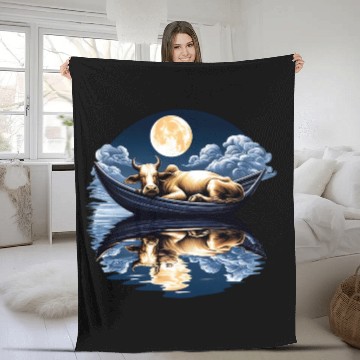 Discover Sleeping cow in boat under the moon Fleece Blankets
