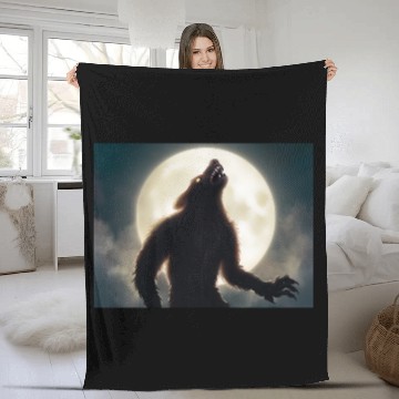 Discover Werewolf standing in front of the moon Fleece Blankets