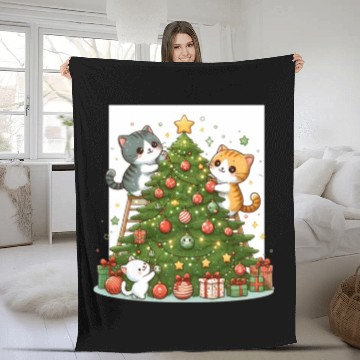 Discover Kittens decorate a Christmas tree Fleece Blankets