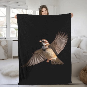 Discover A close-up photo of a cute sparrow bird. Fleece Blankets