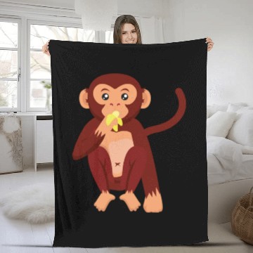Discover Cute monkey eating banana Fleece Blankets