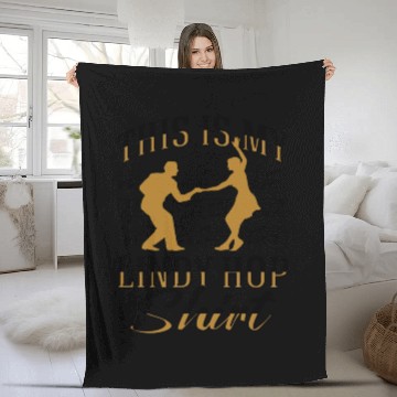 Discover Lindy Hop Dancer Embraces Swing Dance Moves in Fleece Blankets