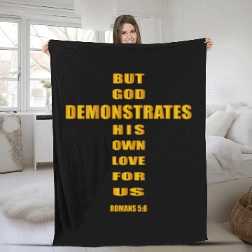Discover But God demonstrates his own love for us romans5:8 Fleece Blankets
