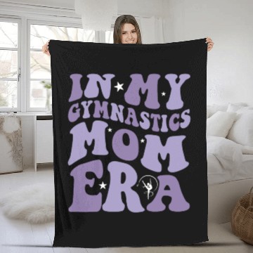 Discover In My Gymnastics Mom Era on back Fleece Blankets