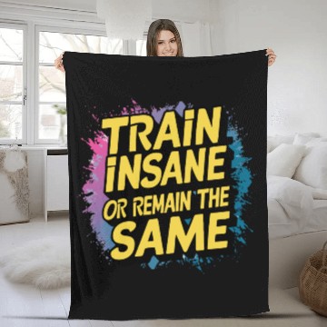 Discover Train insane or remain the same Fleece Blankets