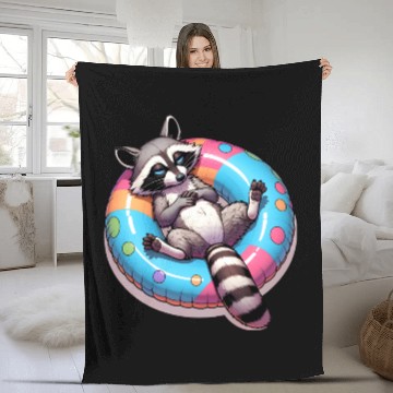 Discover A relaxed raccoon on a swimming ring Fleece Blankets