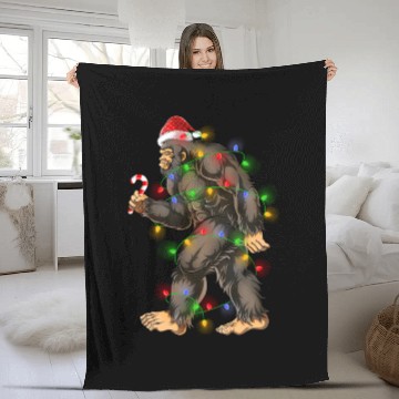 Discover Bigfoot Sasquatch Yeti Candy Cane Christmas Fleece Blankets