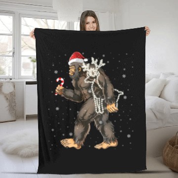 Discover Bigfoot Carrying Deer Lights Xmas Sasquatch Lover Fleece Blankets