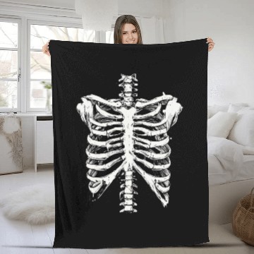 Discover skeleton rib cage spooky halloween Fleece Blankets