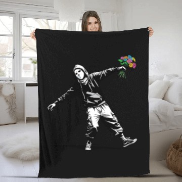 Discover Banksy Protester Throwing Flowers Fleece Blankets