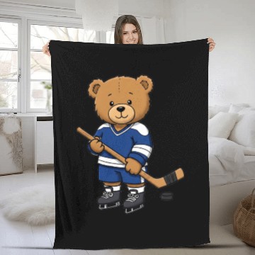 Discover Teddy bear ice hockey player Fleece Blankets