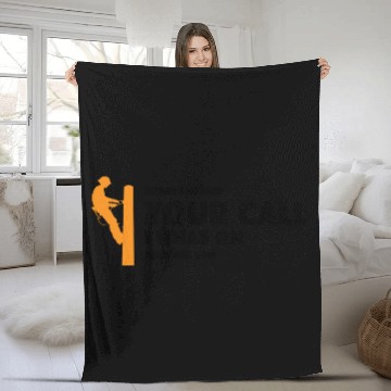 Discover Orange silhouette of a lineman climbing a utility Fleece Blankets