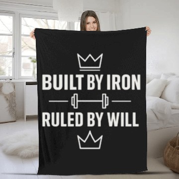 Discover Built by iron gym motivation quote with white text Fleece Blankets