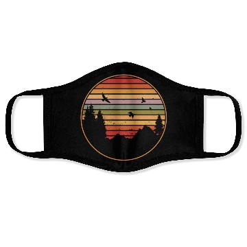 Discover RETRO FOREST WITH BIRDS IN THE SUNSET Face Masks