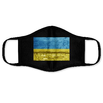 Discover Brick wall with Ukraine flag Face Masks