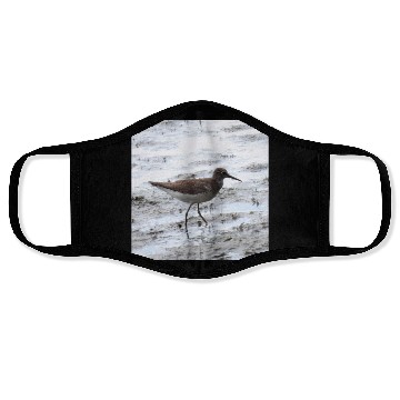 Discover Sandpiper walking along the shore Face Masks