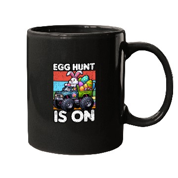 Discover EGG HUNT IS ON EASTER Mugs