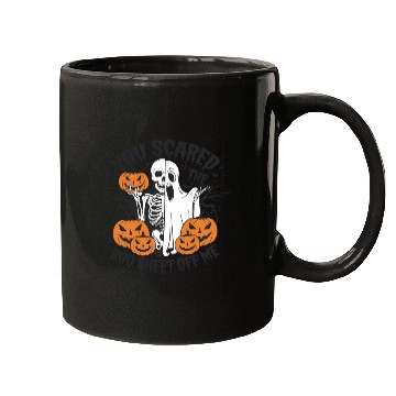 Discover A skeleton with a Halloween costume on it Mugs