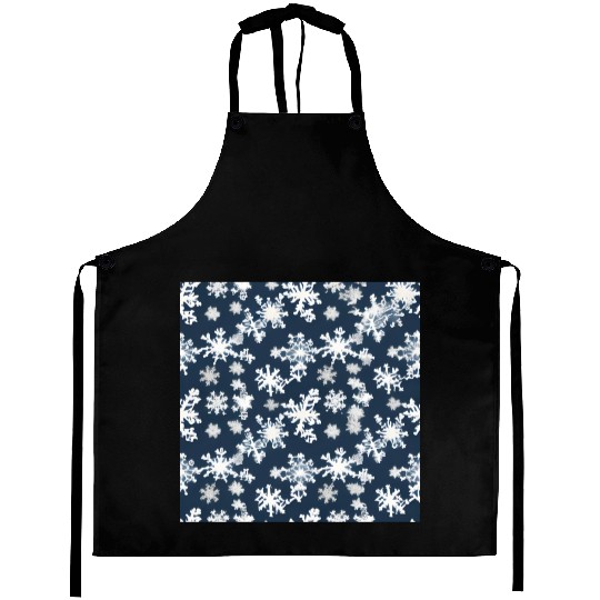 Snow pattern on navy blue background Aprons
