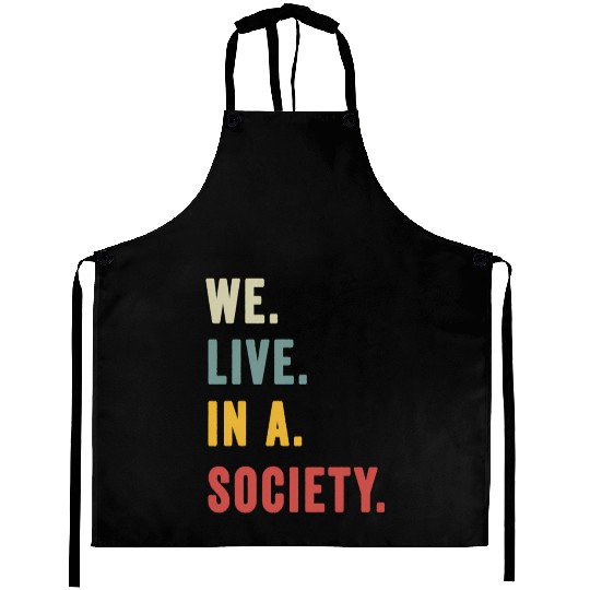 We Live In A Society Aprons