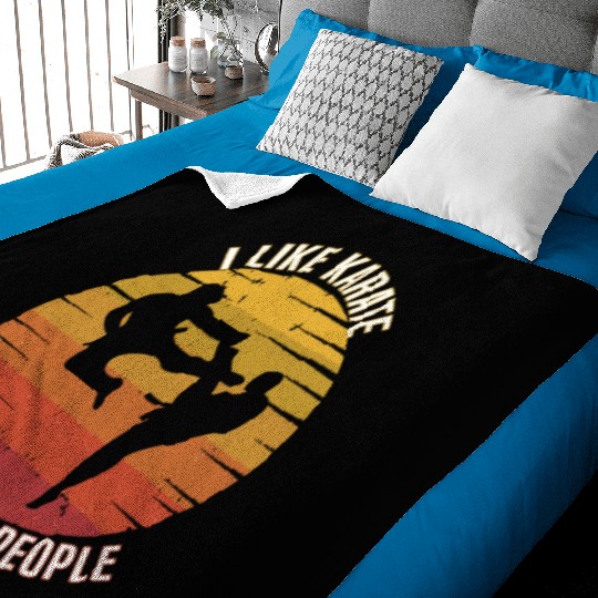 I like karate and maybe three people, karate Baby Blankets