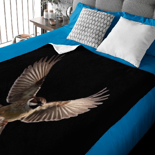 A close-up photo of a cute sparrow bird. Baby Blankets