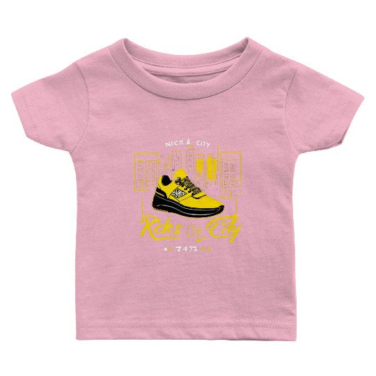 Yellow and black shoe with a cityscape background Baby T Shirts
