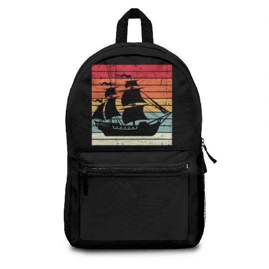 Pirate ship sunset Backpacks