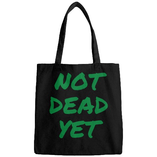 NOT DEAD YET (in green graffiti letters) Bags