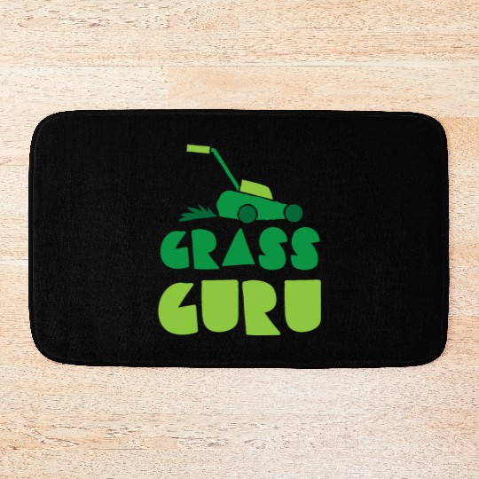 Grass guru with green lawn mower Bath Mats