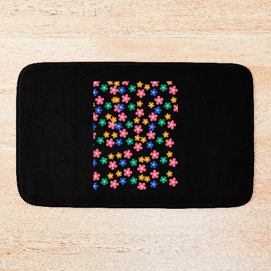 Retro 70s daisy flowers in orange & lilac Bath Mats