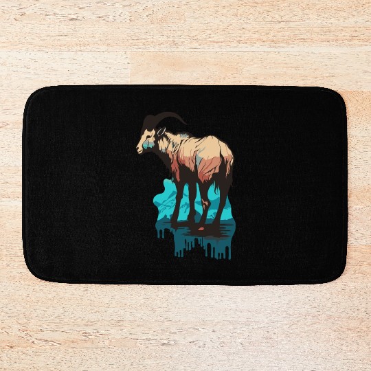 a mountain goat lives in the mountains Bath Mats