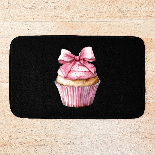 Cupcake with a pink bow Bath Mats