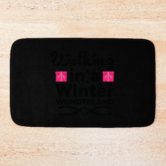 Walking in a winter wonderland Bath Mats