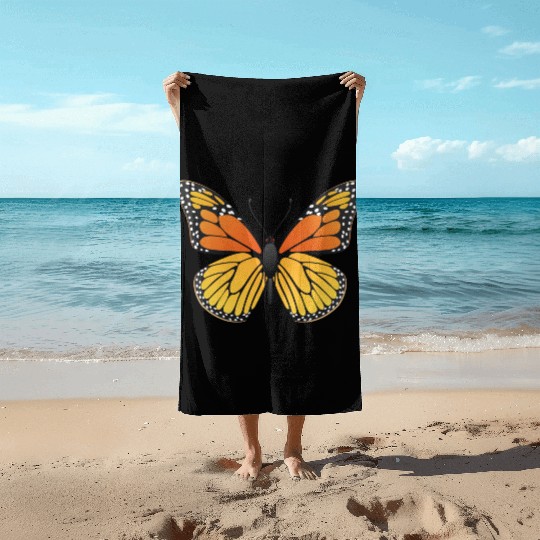 Monarch butterfly Beach Towels