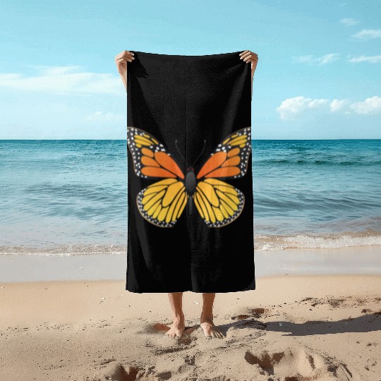Monarch butterfly Beach Towels