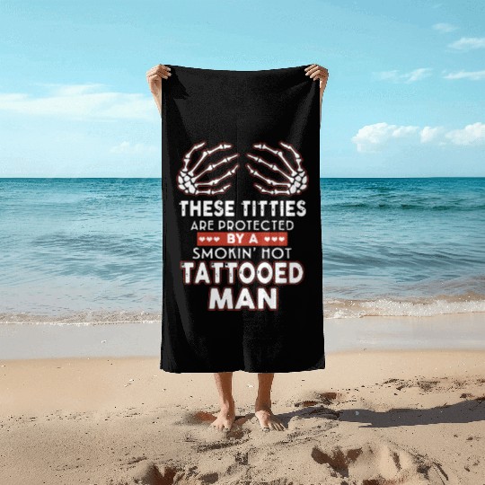 there titties are protected by a smoking hot tatto Beach Towels