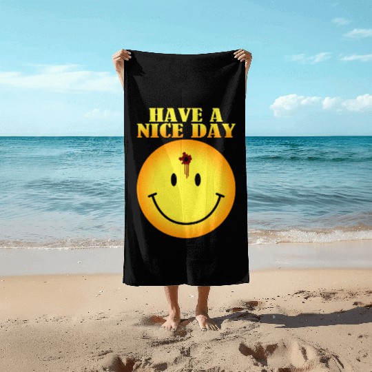 smiley face bullet hole Beach Towels