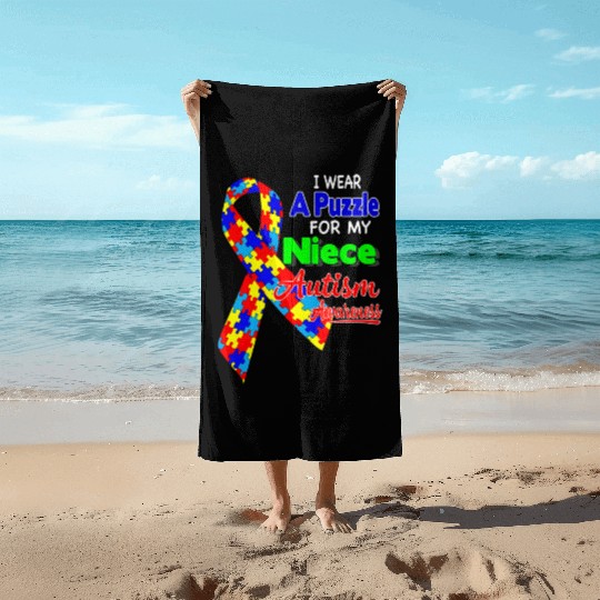 I wear a Puzzle for my Niece Autism Awareness shir Beach Towels