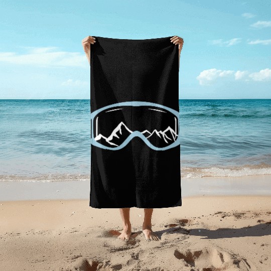 Skiing goggles and mountains Beach Towels