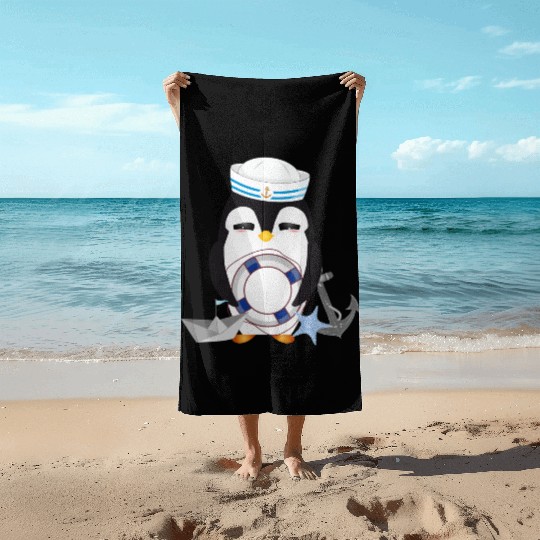 cute penguin as a sailor in marine look Beach Towels