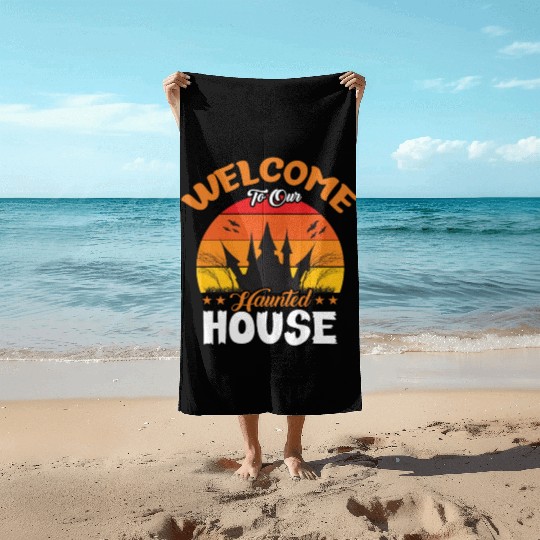 Welcome To Our Haunted House Beach Towels