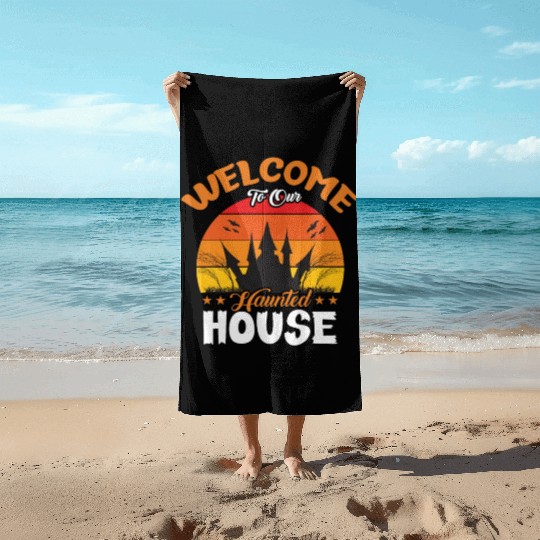 Welcome To Our Haunted House Beach Towels